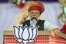 India's Prime Minister Narendra Modi addresses party supporters during an election campaign rally in Himmatnagar, India, May 1, 2024.