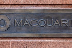Macquarie Group's corporate logo is pictured on the wall of the Sydney headquarters after the Australian bank's full year results were announced, May 6, 2016.