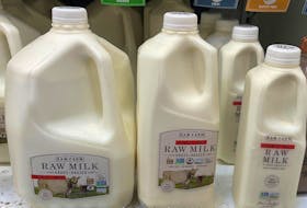 Bottles of raw milk are seen in a display in a Sprouts Farmers Market store in Los Angeles, California, U.S. April 29, 2024.