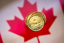 A Canadian dollar coin, commonly known as the "Loonie", is pictured in this illustration picture taken in Toronto, January 23, 2015.   