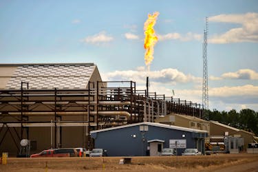 The suspension of steam generation forces this East Primrose steam plant to flare natural gas at Canadian Natural Resources Limited's (CNRL) Primrose Lake oil sands project near Cold Lake, Alberta August 8, 2013.