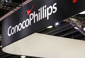 The logo of American oil and natural gas exploration and production company ConocoPhillips is seen during the LNG 2023 energy trade show in Vancouver, British Columbia, Canada, July 12, 2023.