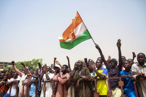 Nigeriens gather in a street to protest against the U.S. military presence, in Niamey, Niger April 13, 2024.