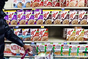 A person walks by a display of Kellogg's cereals, owned by Kellogg Company, in a store in Queens, New York City, U.S., February 7, 2022.