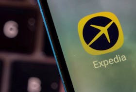 Expedia app is seen on a smartphone in this illustration taken February 27, 2022.