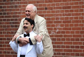 British actor John Cleese poses with cast member, Hemi Yeroham, who plays Manuel, from the play Fawlty Towers at the Apollo Theatre in London, Britain, May 2, 2024.