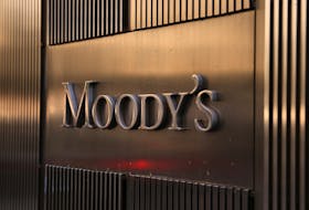 Signage is seen outside the Moody's Corporation headquarters in Manhattan, New York, U.S., November 12, 2021.