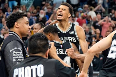Apr 12, 2024; San Antonio, Texas, USA; San Antonio Spurs forward Victor Wembanyama (1) and teammates react after a victory over the Denver Nuggets at Frost Bank Center. Mandatory Credit: Scott Wachter-USA TODAY Sports/File Photo