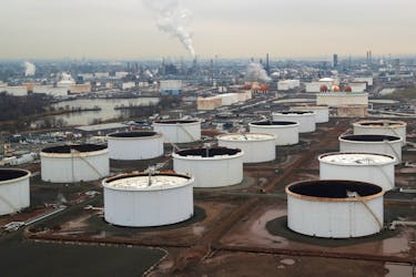 General view of oil tanks and the Bayway Refinery of Phillips 66 in Linden, New Jersey, U.S., March 30, 2020.