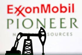 ExxonMobil and Pioneer Natural Resources logos are seen in this illustration taken, October 6, 2023.