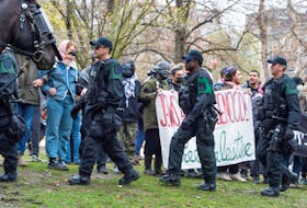 Police patrol near a protest encampment in support of Palestinians, during the ongoing conflict between Israel and the Palestinian Islamist group Hamas, at McGill University’s campus in Montreal, Quebec, Canada May 2, 2024.