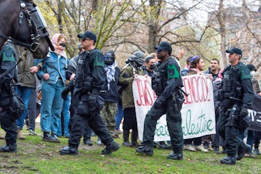 Police patrol near a protest encampment in support of Palestinians, during the ongoing conflict between Israel and the Palestinian Islamist group Hamas, at McGill University’s campus in Montreal, Quebec, Canada May 2, 2024.