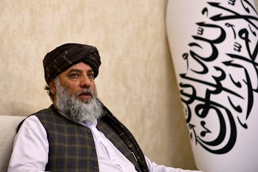 Taliban's acting commerce minister Haji Nooruddin Azizi speaks during an interview with Reuters, at the Embassy of Afghanistan in Beijing, China October 19, 2023.