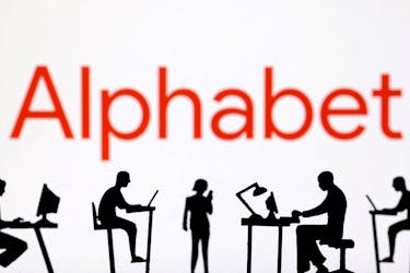 Figurines with computers and smartphones are seen in front of Alphabet logo in this illustration taken, February 19, 2024.