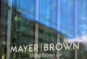 Signage is seen outside of the law firm Mayer Brown LLP in Washington, D.C., U.S., August 30, 2020.