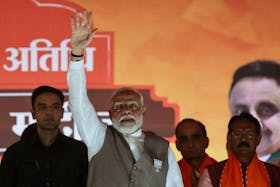 India's Prime Minister Narendra Modi greets his supporters during an election campaign rally, in New Delhi, India, May 18, 2024.
