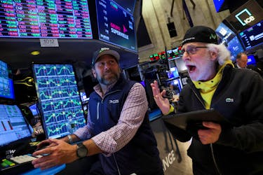 Traders work on the floor at the New York Stock Exchange (NYSE) in New York City, U.S., May 16, 2024. 