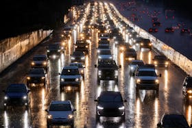 Vehicles drive as flood hits in Tarzana, in the San Fernando Valley region of Los Angeles, California, U.S. February 1, 2024.