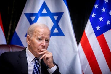 U.S. President Joe Biden pauses during a meeting with Israeli Prime Minister Benjamin Netanyahu to discuss the ongoing conflict between Israel and Hamas, in Tel Aviv, Israel, Wednesday, Oct. 18, 2023.  Miriam Alster/Pool via