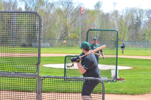 Charlottetown Gaudet’s Auto Body Islanders first baseman Nick MacPhail waits on a pitch from assistant coach Mark Arsenault during a practice at Memorial Field in Charlottetown on May 18. The Islanders open the 2024 New Brunswick Senior Baseball League (NBSBL) regular season against the Moncton Mets at Memorial Field on May 21 at 8 p.m. Jason Simmonds • The Guardian