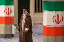 Iran's Supreme Leader Ayatollah Ali Khamenei arrives to cast his vote during runoff parliamentary elections in Tehran, Iran, May 10, 2024. Majid Asgaripour/WANA (West Asia News Agency) via