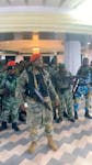 A man in military fatigues speaks as others stand next to him inside the Palace of the Nation during an attempted coup in Kinshasa, Democratic Republic of Congo, May 19, 2024 in this screen grab from a social media video. Christian Malanga/Handout via