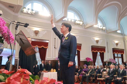 Taiwan's new President Lai Ching-te takes his oath during the inauguration ceremony at the Presidential Office Building in Taipei, Taiwan in this handout image released May 20, 2024. Taiwan Presidential Office/Handout via REUTERS