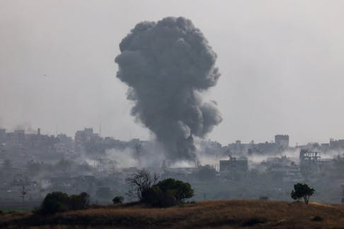 Smoke rises from an explosion following an airstrike in Gaza, amid the ongoing conflict between Israel and the Palestinian Islamist group Hamas, near the Israel-Gaza border, as seen from Israel, May 20, 2024.