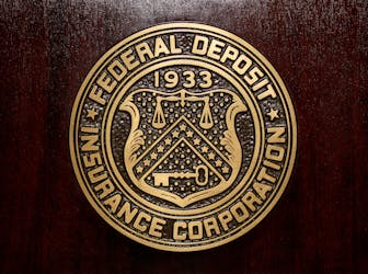 The Federal Deposit Insurance Corp (FDIC) logo is seen at the FDIC headquarters in Washington, February 23, 2011.