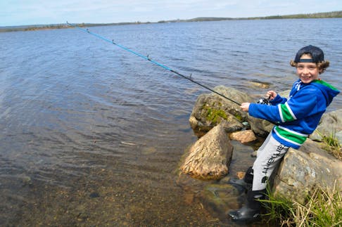 He might not have caught a big trout, but Paradise resident nine-year-old Keegan Eddy, a Grade 4 student at Holy Family School in the town, was sure enjoying himself at Paddy’s Pond on Sunday afternoon, May 19th., 2024, trying to haul in a few fish for himself. He was there with his mom Paulette Johnson and big sister Kiley, 12, having a few casts with his fishing pole. Unlike last year in 2023, the temperatures this Victoria Day long-holiday weekend weren’t the warmest, but folks like Keegan were still enjoying the great outdoors after a long winter as it marked the unofficial start of the summer camping and fishing holiday season.  -Photo by Joe Gibbons/The Telegram