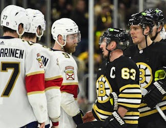 Boston Bruins captain Brad Marchand (63) shakes hands with Florida Panthers centre Sam Bennett (9) after the Panthers defeated the Bruins in Game 6 of the second round of the 2024 Stanley Cup Playoffs at TD Garden in Boston on Friday. - Bob DeChiara-USA TODAY Sports