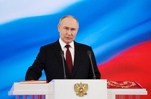 Russian President Vladimir Putin takes the oath of office during his inauguration ceremony at the Kremlin in Moscow, Russia May 7, 2024. Sputnik/Vyacheslav Prokofyev/Pool via