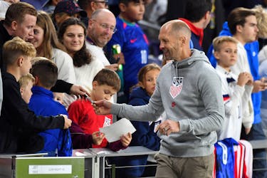 Oct 17, 2023; Nashville, Tennessee, USA; United States head coach Gregg Berhalter signs autographs for fans after a win against Ghana at GEODIS Park. /Christopher Hanewinckel-USA TODAY Sports/File Photo