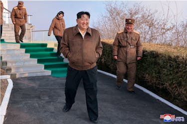North Korean leader Kim Jong-un attends a ground test of a solid-fuel engine for a new type of intermediate-range hypersonic missile as part of a program of developing national defense capability, at an unknown location in North Korea, March 19, 2024. KCNA via REUTERS /File Photo