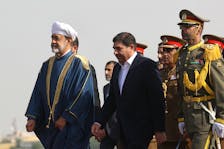 Iran's First Vice President Mohammad Mokhber welcomes Oman's Sultan Haitham bin Tariq upon his arrival at Mehrabad Airport in Tehran, Iran May 28, 2023.   Majid Asgaripour/WANA (West Asia News Agency) via
