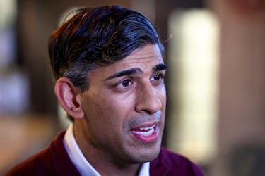 Britain's Prime Minister Rishi Sunak speaks to the press during a visit to Omnom, a restaurant and community centre in London, Britain, May 6, 2024. HENRY NICHOLLS/File Photo