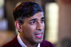 Britain's Prime Minister Rishi Sunak speaks to the press during a visit to Omnom, a restaurant and community centre in London, Britain, May 6, 2024. HENRY NICHOLLS/File Photo