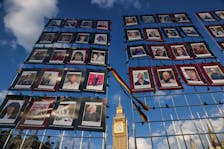 Images of victims of the contaminated blood scandal are displayed during a vigil to remember those that lost their lives, ahead of the release of final report of the Infected Blood Inquiry on Monday, in London, Britain, May 19, 2024.