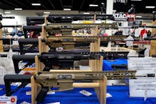 AR-15 rifles are displayed for sale at the Guntoberfest gun show in Oaks, Pennsylvania, U.S., October 6, 2017.  