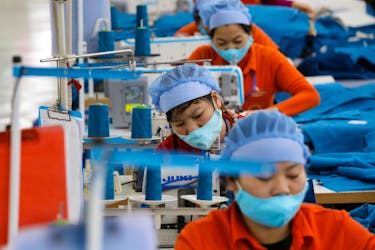 Women work at Hung Viet garment export factory in Hung Yen province, Vietnam December 30, 2020.