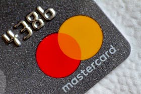 A Mastercard logo is seen on a credit card in this picture illustration August 30, 2017.
