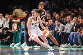 May 18, 2024; Brooklyn, New York, USA;  Indiana Fever guard Caitlin Clark (22) spins away from New York Liberty forward Nyara Sabally (8) in the fourth quarter at Barclays Center. / Wendell Cruz-USA TODAY Sports/File Photo