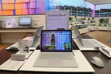 Surface book laptops sit on display at Microsoft's new Oxford Circus store ahead of its opening in London, Britain July 9, 2019. Picture taken July 9, 2019.