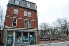 Photo of the former Breakwater Books building on 100 Water Street East in downtown St. John’s as seen here on Friday, January 6, 2023. The building was damaged in the major early morning fire at the former Williams Roboethan McKay Marshall law firm on Saturday morning, June 12, 2010. Completely destroyed in the fire, the law firm fronted onto Duckworth Street, while Breakwater building, behind the firm, has remained vacant ever since the multi-alarm fire. To go with story on the Breakwater Books building and the empty lot aside it, adjacent to the National War Memorial. -Photo by Joe Gibbons/The Telegram