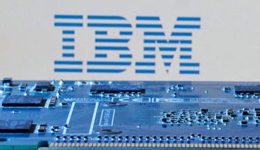 IBM logo is seen near computer motherboard in this illustration taken January 8, 2024.