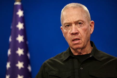 Israeli Defence Minister Yoav Gallant speaks during a joint press conference with U.S. Secretary of Defense Lloyd Austin at Israel's Ministry of Defense in Tel Aviv, Israel December 18, 2023.