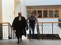 Dakota James Ellis, 19, and his lawyer Brendan Hubley, in P.E.I. Supreme Court on May 17.  Ellis pleaded guilty that day to five arson incidents that occurred over a two-day period in November 2023.