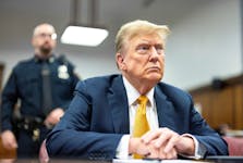 Former U.S. President Donald Trump looks on as he is sitting at the defendant's table during his criminal trial at New York State Supreme Court in New York City, U.S., May 21, 2024. JUSTIN LANE/Pool via REUTERS