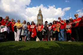 People impacted by the contaminated blood scandal participate in a minute of silence during a vigil to remember those that lost their lives, ahead of the release of final report of the Infected Blood Inquiry on Monday, in London, Britain, May 19, 2024.