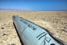 View of the apparent remains of a ballistic missile, as it lies in the desert near the Dead Sea, following a massive missile and drone attack by Iran on Israel, in southern Israel April 21, 2024